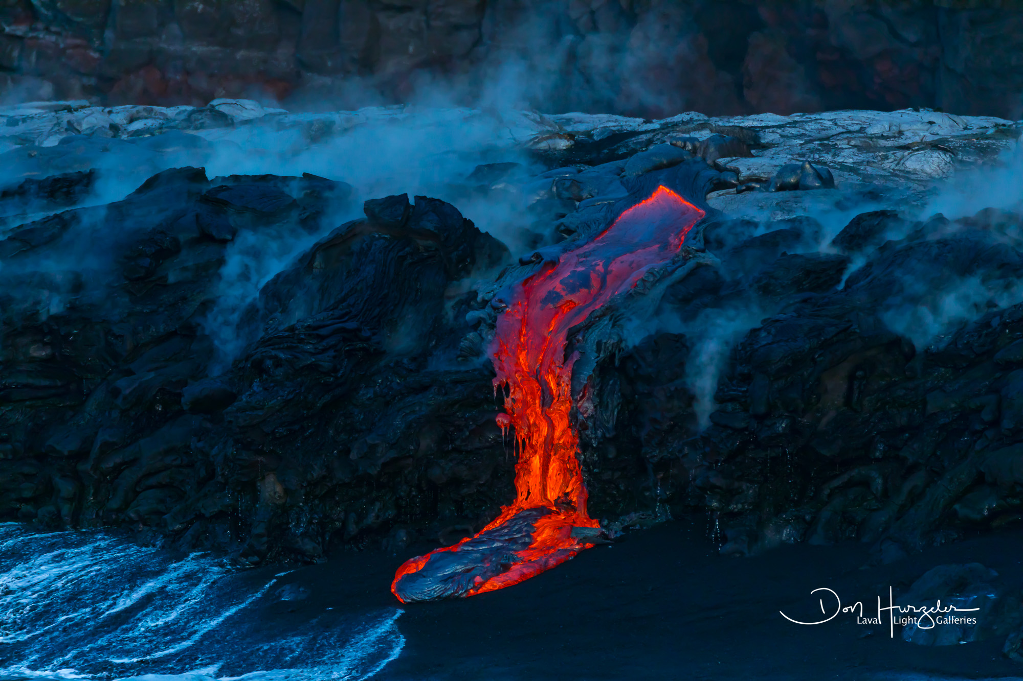 Lava dripping from the bench to the beach.