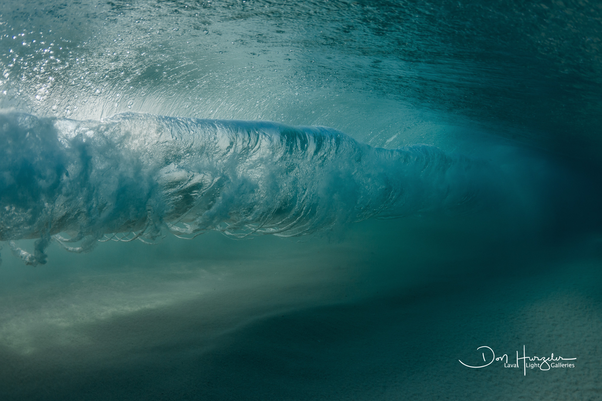 Rings from behind the wave.