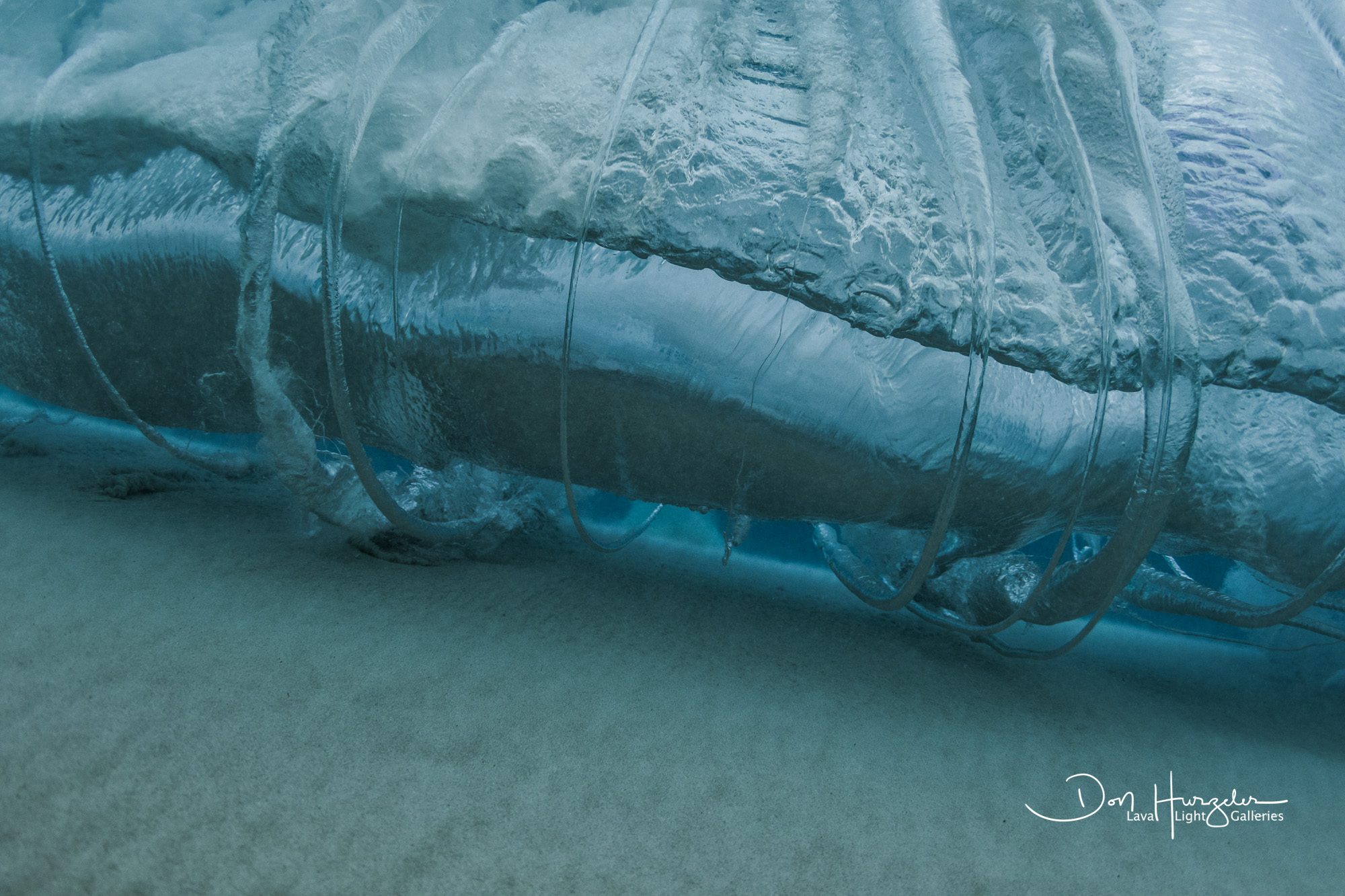 Steam Roller You are looking at a wave rolling toward the camera just as it breaks. the rings last less than a half second and serve to vent...